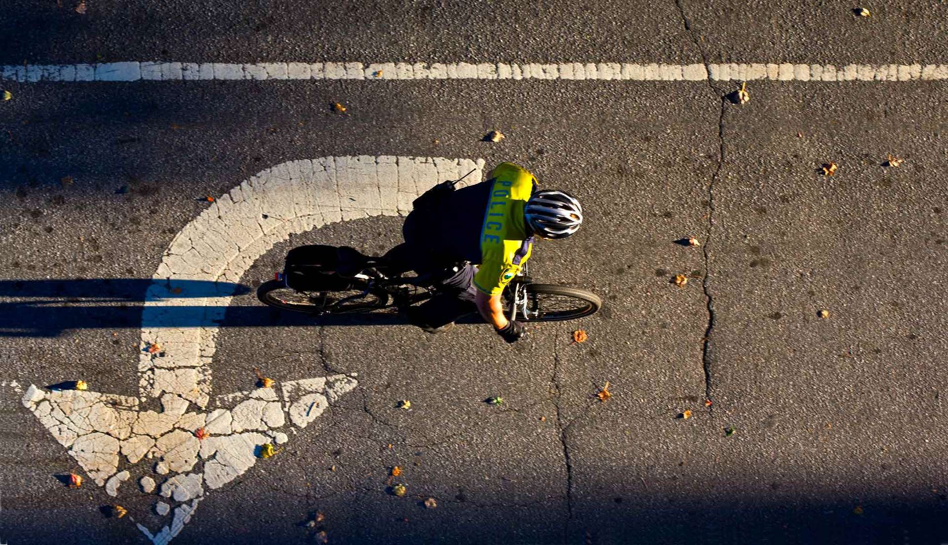 "Police on Bike in Street Arrow"  <br>     Asheville,NC