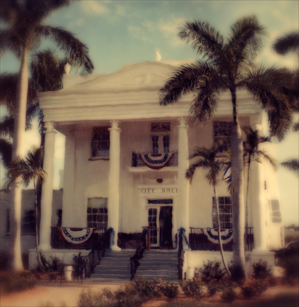 "City Hall" <br>Colonial-Style Building with Royal Palms and American Flags, Everglades City, FL